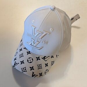 Louis Vuitton Tan Cap with Black Monogram.